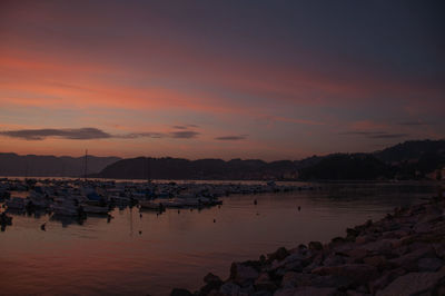 Scenic view of sea against sky at sunset