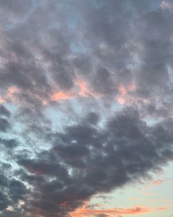 Low angle view of dramatic sky during sunset