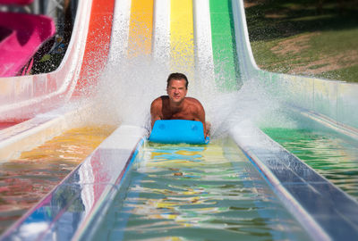 Man playing in swimming pool