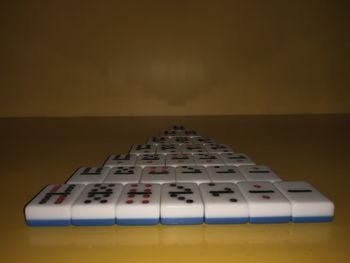 Close-up of telephone booth on table