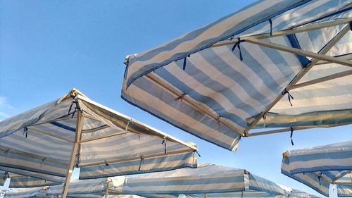 Low angle view of built structure against blue sky