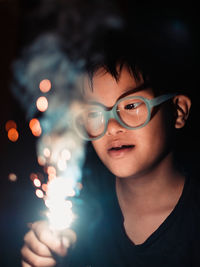 Portrait of teenage boy wearing eyeglasses