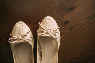 Low section of shoes on table