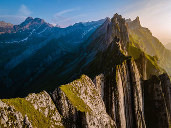 Panoramic view of snowcapped mountains against sky