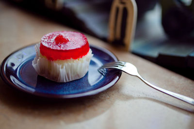 Close-up of cake in plate on table