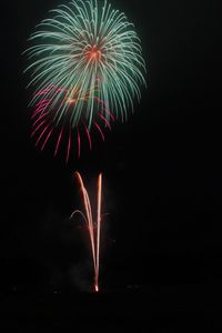 Firework display at night