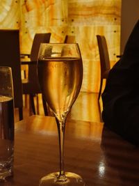 Close-up of beer glass on table