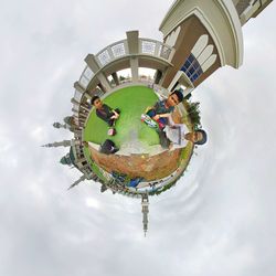 Digital composite image of people in swimming pool against sky