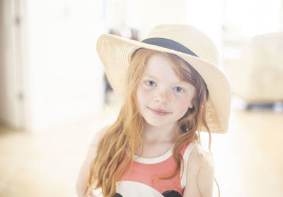 Young woman wearing hat