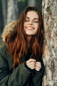 Portrait of smiling young woman