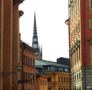 Buildings in city against sky