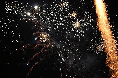 Low angle view of firework display