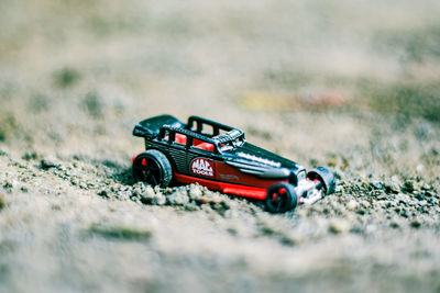 Close-up of toy car on field