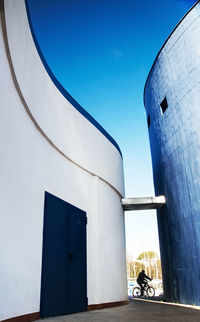 Low angle view of building against blue sky