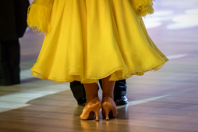 Low section of woman standing on floor