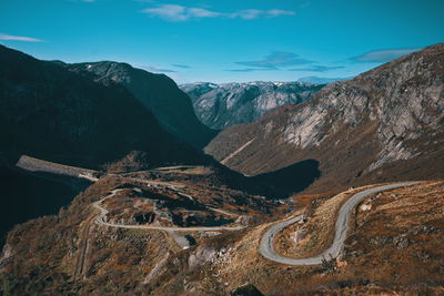 Aerial view of mountain range against sky