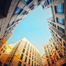 Low angle view of modern buildings in city