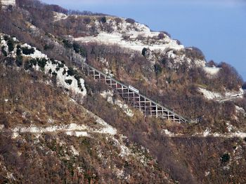 Built structure on land against sky