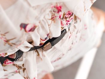 High angle view of woman holding umbrella