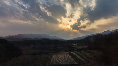 Scenic view of landscape against sky during sunset