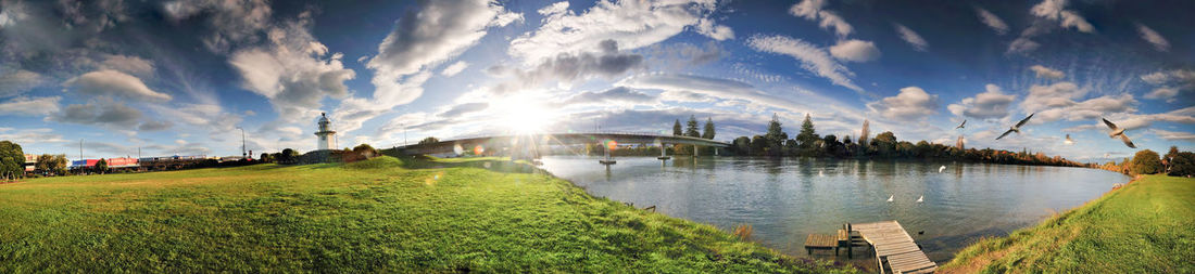 Panoramic view of landscape against cloudy sky