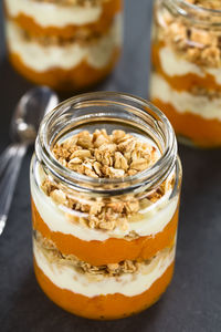 Close-up of beer in glass jar on table