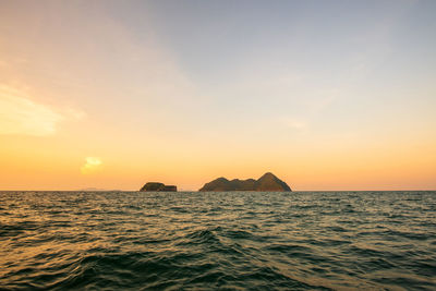 Scenic view of sea against sky during sunset