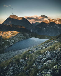 Scenic view of lake against sky during sunset