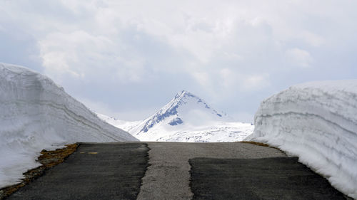 Snow covered mountain against sky