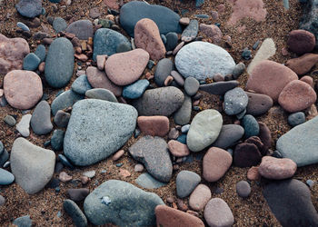 High angle view of pebbles at beach