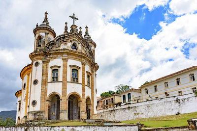 View of old historic baroque style churc and some houses on ouro preto city at minas gerais state