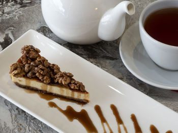 High angle view of coffee in plate on table