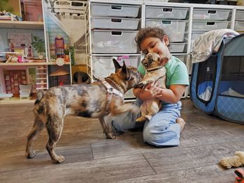 Full length of boy with dog