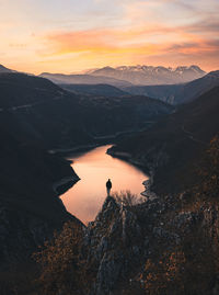 Scenic view of mountains against sky during sunset