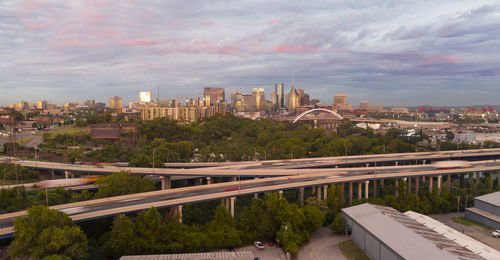 High angle view of buildings in city against sky