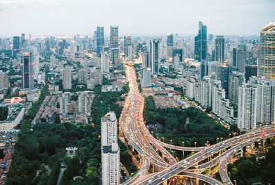 High angle view of street amidst buildings in city