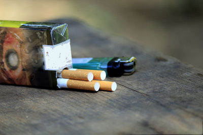 Close-up of cigarette on table