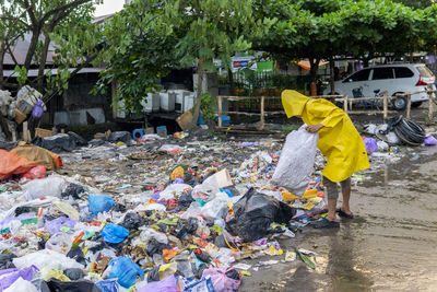 Sanitation worker picking up garbage