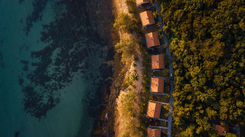Directly above shot of built structures by sea