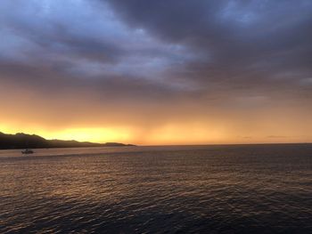 Scenic view of sea against sky during sunset