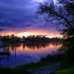 Scenic view of lake at sunset