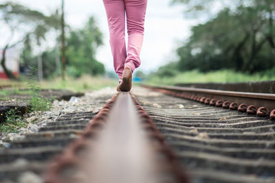 Low section of person on railroad track