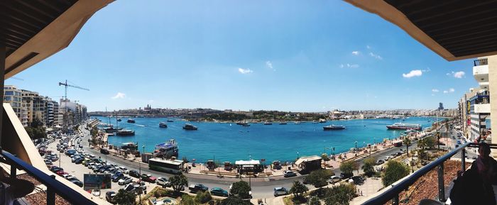 High angle view of harbor by sea against sky