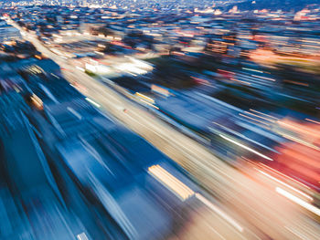 High angle view of light trails on city street