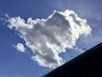 Low angle view of built structure against blue sky