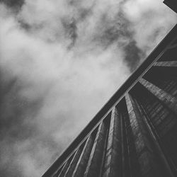 Low angle view of building against cloudy sky