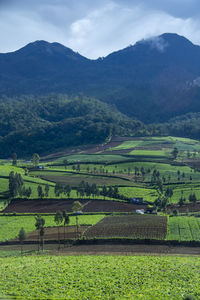 High angle view of landscape and mountains against sky