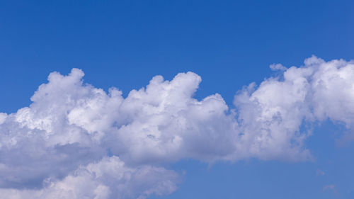 Low angle view of clouds in blue sky