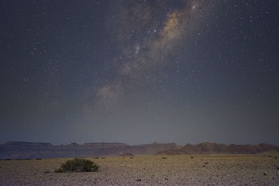 Scenic view of sea against sky at night