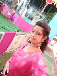 Portrait of young woman looking away